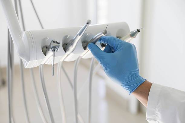 Professional Invisalign Clear Aligners technician working in Grove, OK